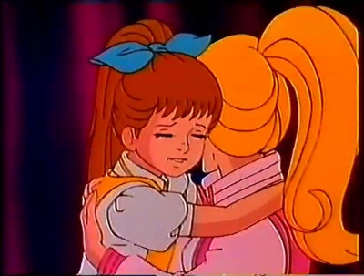 Barbie and Kim hugging and saying their goodbyes